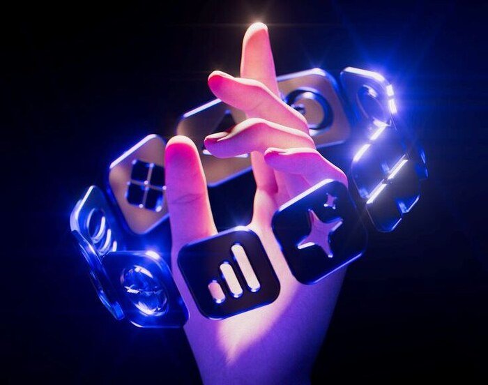 Hand surrounded by glowing interactive app icons